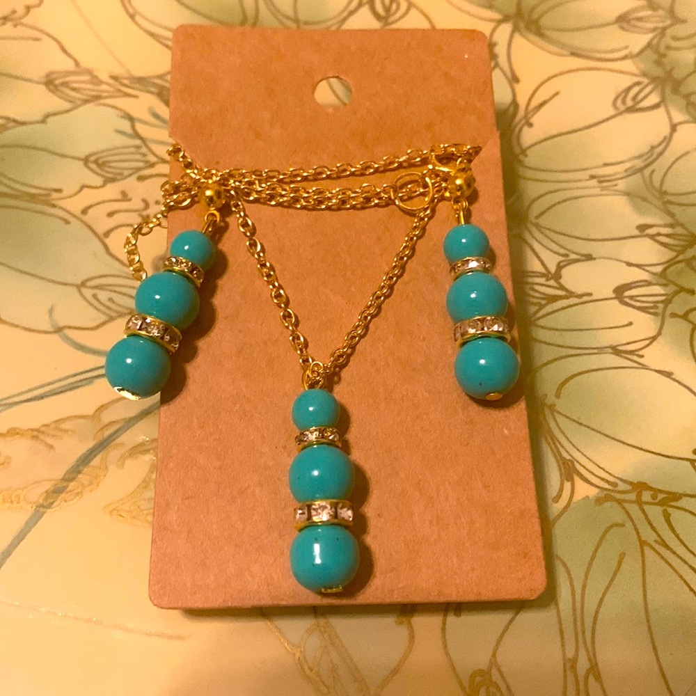 Czech Druk glass bead matching earrings and necklace teal